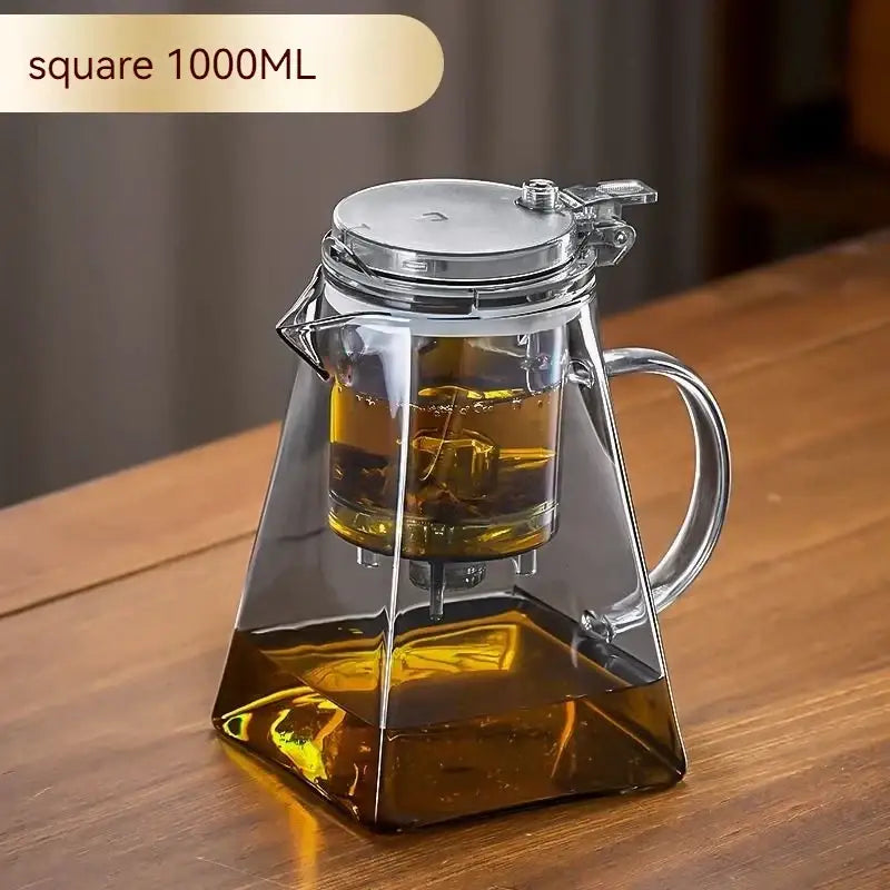 Square-shaped decorbites glass teapot with stainless steel lid and handle holding 1000ml amber liquid for brewing tea