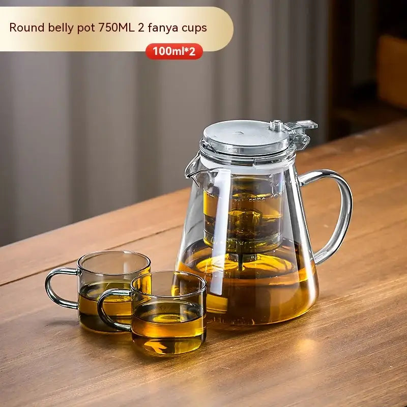 Clear glass round belly decorbites glass teapot set with silver lid and two matching transparent fanya cups for brewing tea