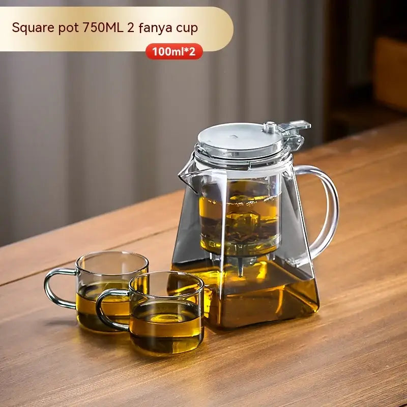 Clear glass square decorbites glass teapot set with silver lid handle and two matching transparent cups for brewing tea