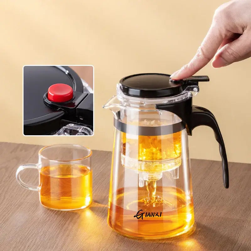 Clear glass decorbites glass teapot with black lid and handle featuring built-in strainer for steeping loose leaves
