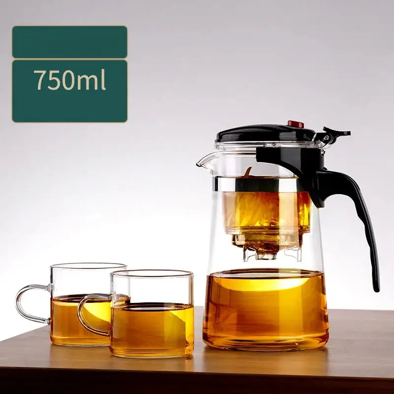DecorBites glass teapot 750ml clear glass infuser pot with black lid and handle filled with brewed tea