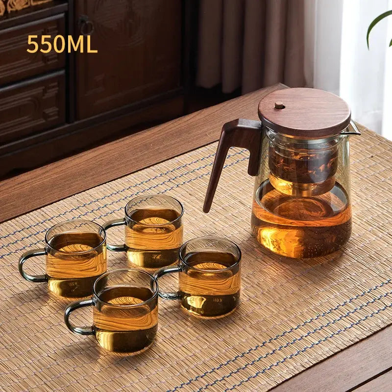 Clear glass decorbites glass teapot with dark wood handle lid and internal infuser for heat resistant brewing