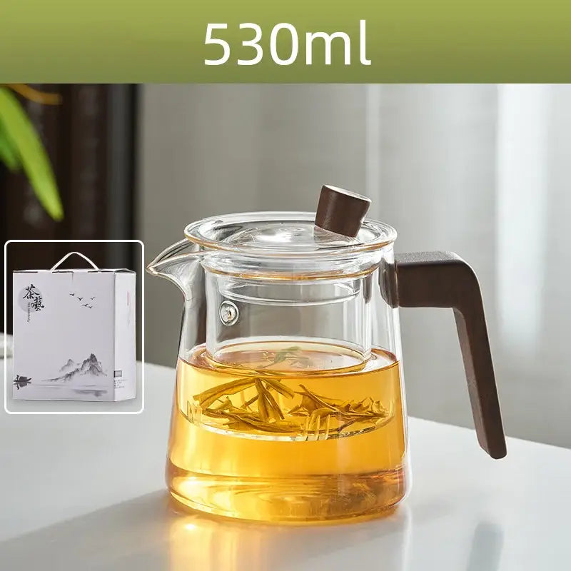 530ml decorbites glass teapot with dark brown wood handle and lid knob filled with golden tea leaves for tea ceremony
