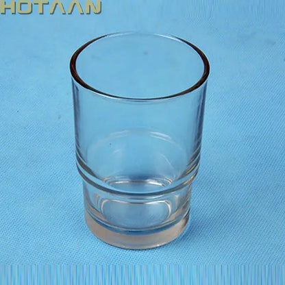 DecorBites glass tumbler cup in clear glass with thick rounded rim and ridged base for bathroom cup holder use