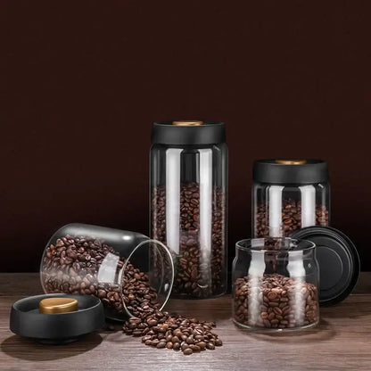 Clear glass coffee bean storage jars with black lids and gold-toned seals for decorbites glass vacuum sealed canisters