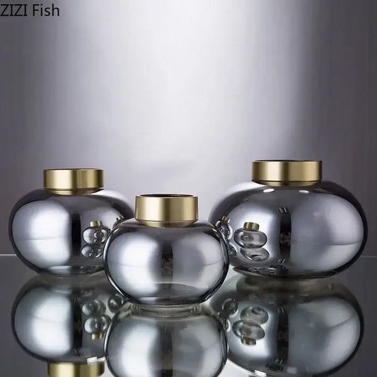 Set of three sleek metallic finish decorbites glass vases with polished gold lids ideal for glass vase desk decoration