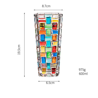 A tall decorbites glass vase flower pot with colorful mosaic square tiles in red blue green yellow and orange
