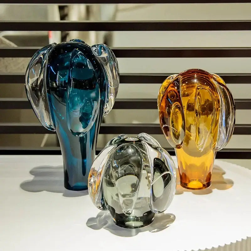 Decorbites glass vase hot air balloon accessory featuring three translucent glass cactus sculptures in blue amber and clear hues