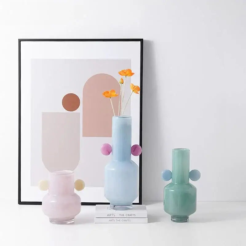 Pastel blue decorbites glass vase with pink spherical handles for floral arrangement accessory use