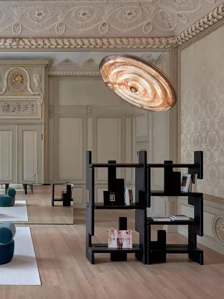 A bronze-toned decorbites glass wall lamp with a layered concentric design dimmable led modern wall lamp