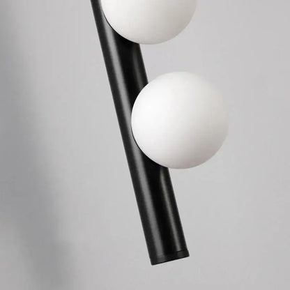 Black decorbites glass wall lamp featuring two white spherical glass shades for clubhouse villa living room and bedroom