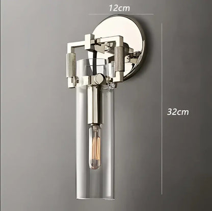 Modern chrome-finished decorbites glass wall lamp with clear glass cylinder and exposed filament bulb for industrial decor