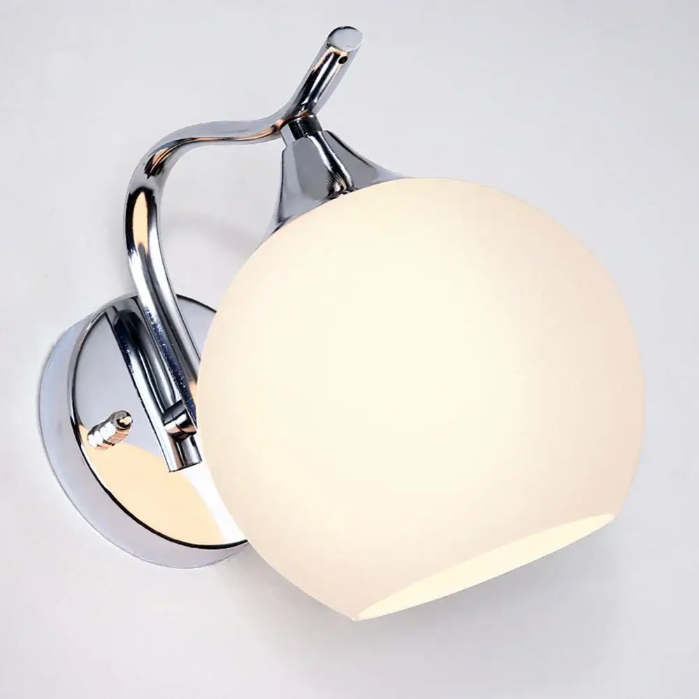 Chrome-finished decorbites glass wall sconce with frosted glass globe shade for modern luxury bedroom and corridor lighting