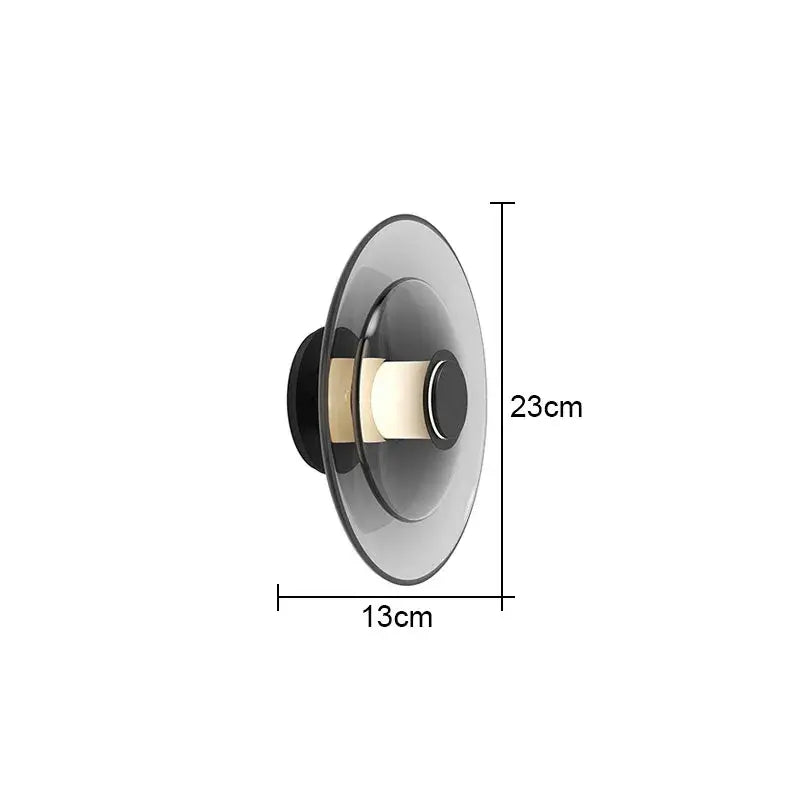 Modern minimalist decorbites glass wall lamp with sleek translucent dark gray glass shade and black base for living spaces