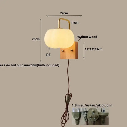 DecorBites glass wall light fixture with warm-toned frosted glass lampshade and walnut wood base with iron hook
