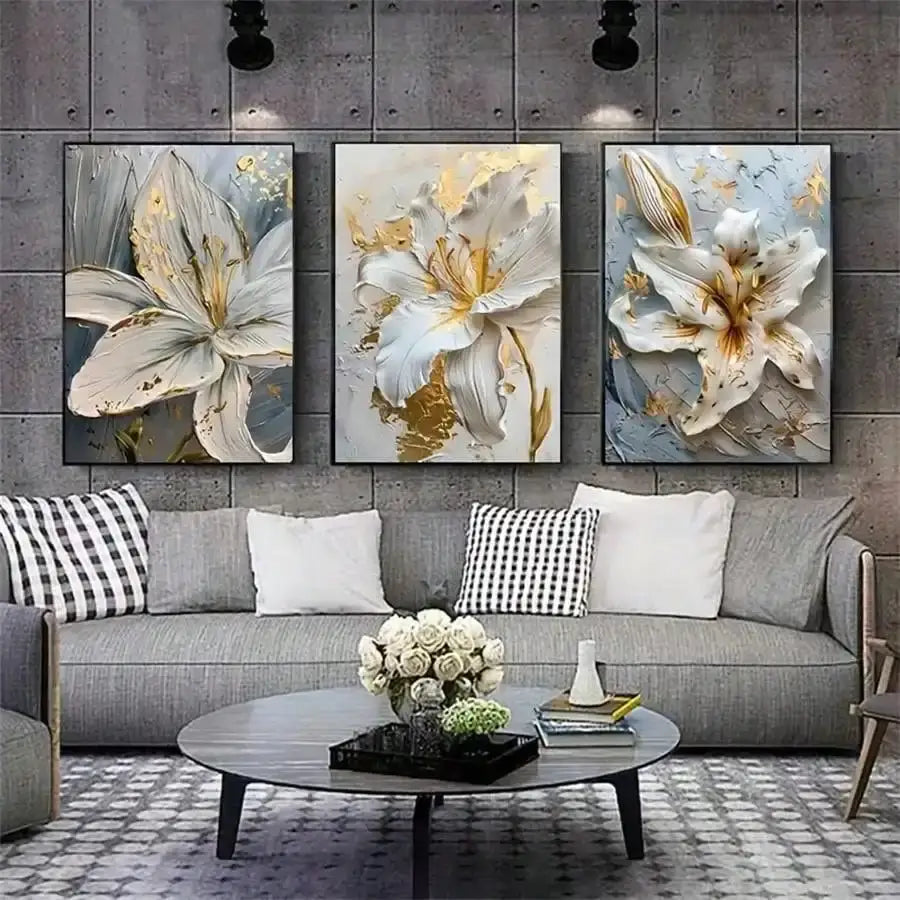 DecorBites gold and white floral 3D wall art featuring textured white flower canvas with gold accents on blue-gray panels