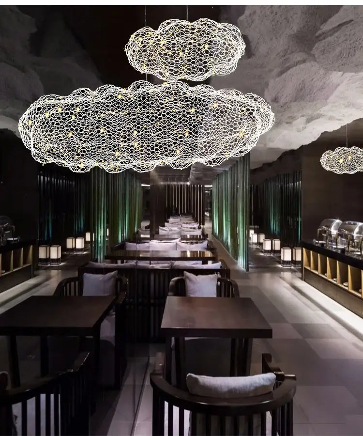 White cloud pendant lights with delicate gold wire mesh design for home and restaurant decor by DecorBites™