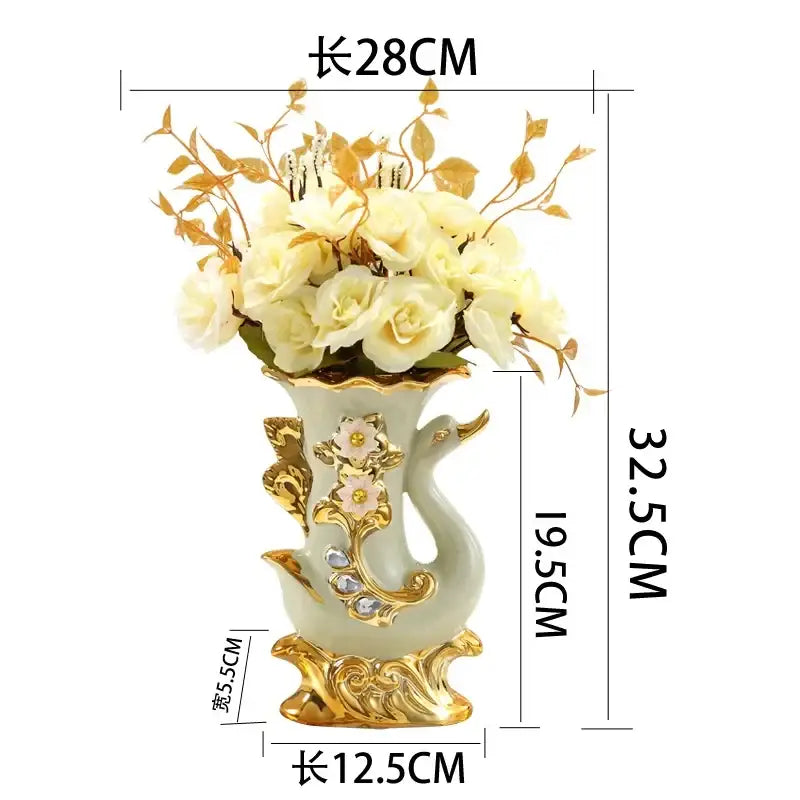 Elegant light green ceramic swan-shaped vase with gold accents and floral details in decorbites gold glass vase design