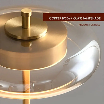 A modern decorbites gold lustre glass mushroom table lamp with brushed copper body and clear glass lampshade for bedroom wood accent