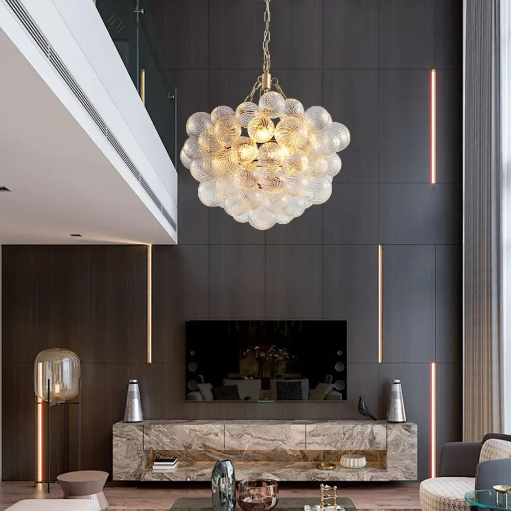 DecorBites gold pendant chandelier with adjustable height featuring bubble-like glass orbs and gold-toned chain pendant light
