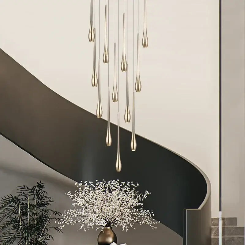 Decorbites gold-plated duplex teardrop chandelier features a modern gold-toned pendant design for living room lighting