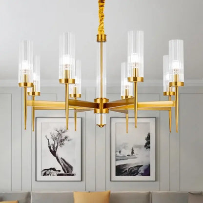 Gold plated nordic living room chandelier by decorbites with gold-toned frame, clear glass cylindrical shades, and twisted chain suspension