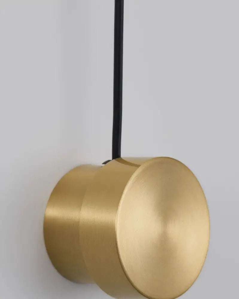 Decorbites™ gold wall lamp with dimmer switch features a sleek brushed gold cylindrical design and black cord wall lamp