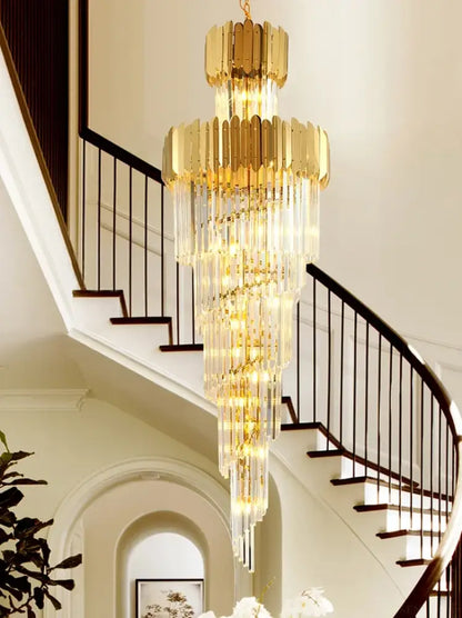 Golden chandelier with cascading crystal tiers and sleek modern design for decorbites golden luxury hotel lobby