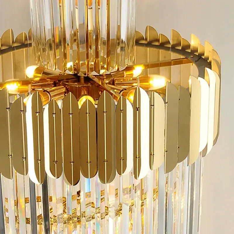 Gold-toned decorbites golden luxury hotel lobby chandelier with crystal prisms and metallic leaf-shaped accents