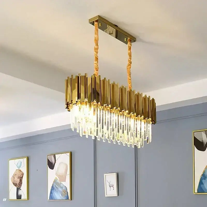 Gold-toned decorbites golden luxury led crystal chandelier with vertical brass bars and dangling crystal droplets for living room light