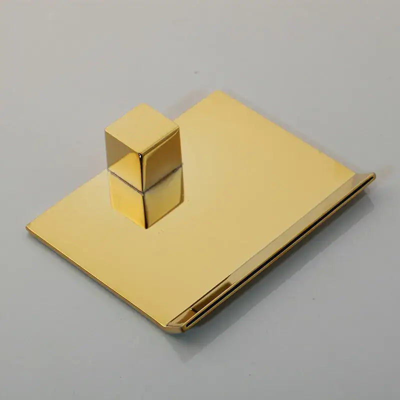 Gold-colored decorbites golden plated sleek money clip with minimalist design and cube-shaped accent on top