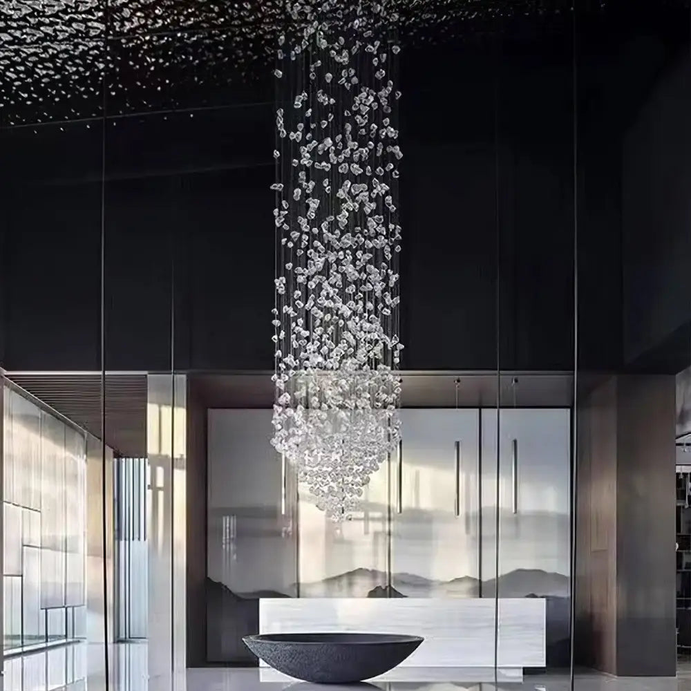 DecorBites™ green crystal stone chandelier featuring cascading clear crystal stones from a dark ceiling for modern spaces