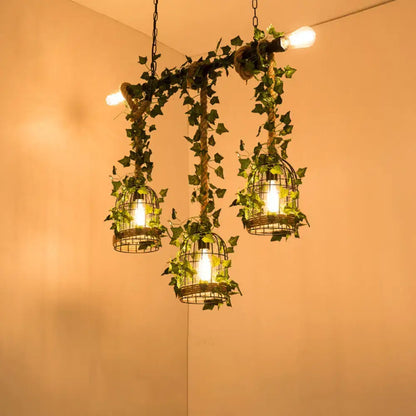 DecorBites™ farmhouse island light with three wire birdcage faux plant shades and warm-toned bulbs in metallic barrel flared design