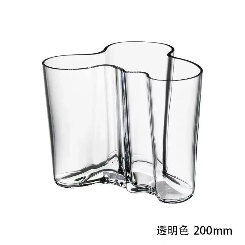 DecorBites™ green glass vase with a distinctive flowing multi-lobed design and smooth curved edges for modern decor