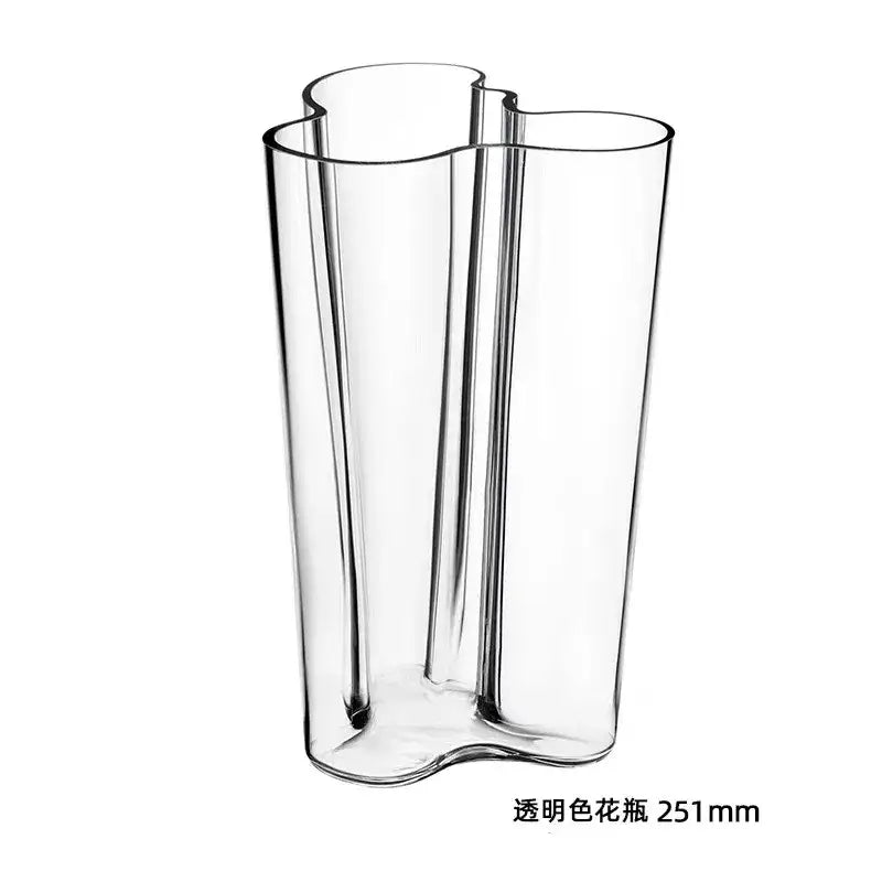 DecorBites™ green glass vase with a smooth, transparent surface and wavy three-lobed silhouette for modern decor
