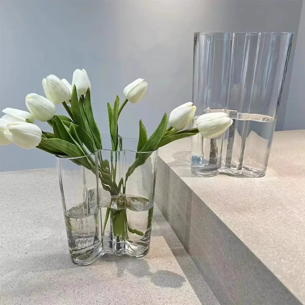 Decorbites™ green glass vase with modern wavy design holding white tulips for stylish home decor