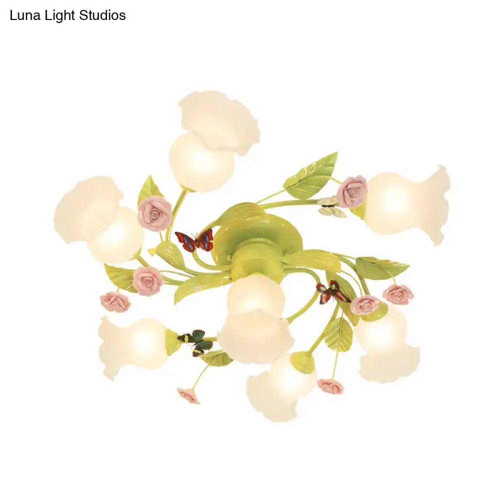 DecorBites™ green opaque glass spiral ceiling light fixture with pastel green and pink floral design and butterfly accents