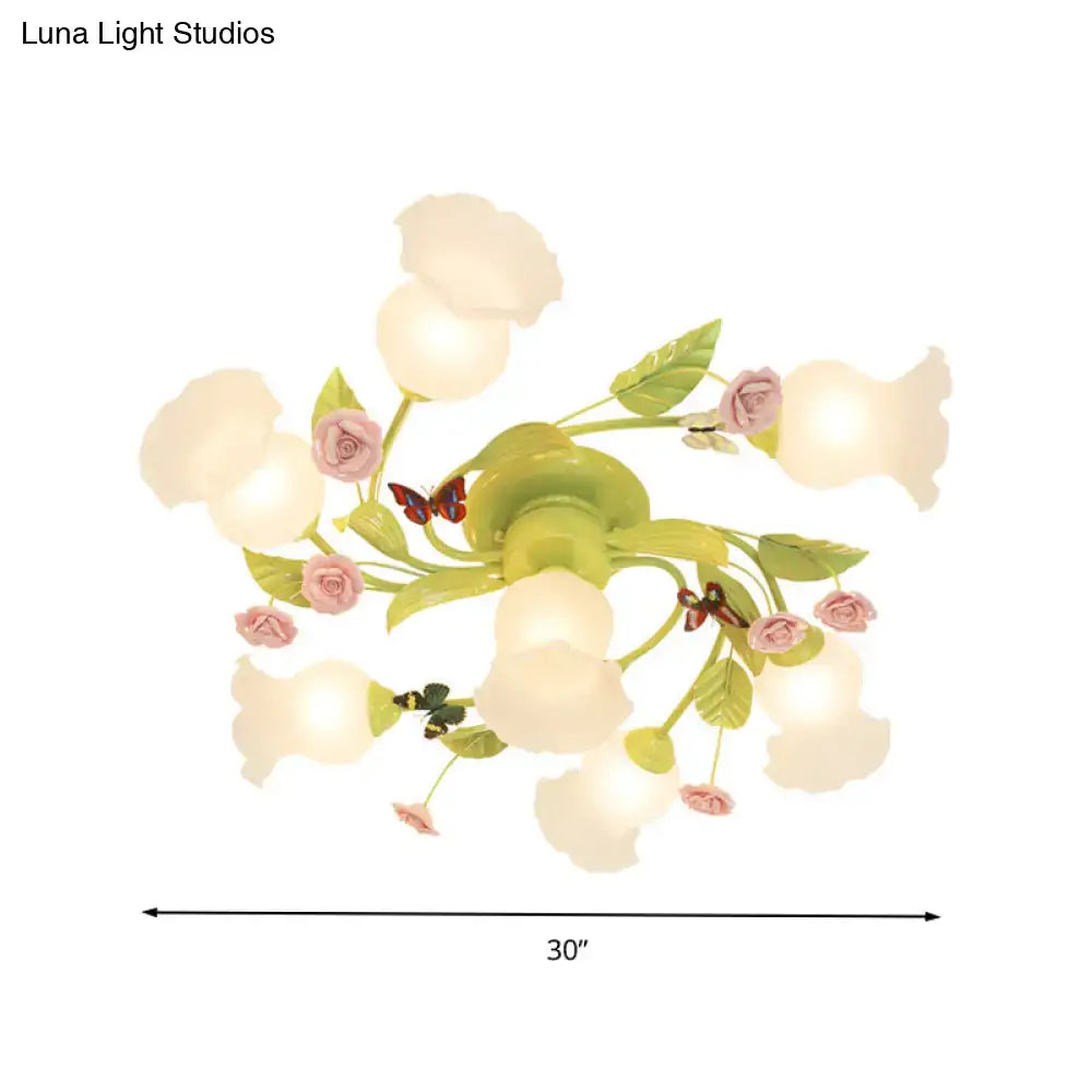 DecorBites™ green opaque glass spiral ceiling light fixture with pastel green and pink floral design and butterfly accents