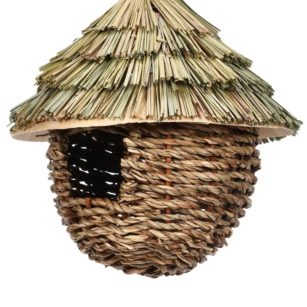 DecorBites handwoven hummingbird house with thatched reed roof and twine features a charming decorative nest house hole
