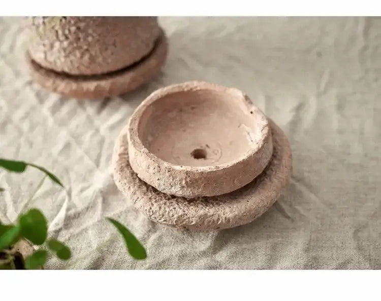 Rustic terracotta DecorBites™ handcrafted ceramic vase with textured earthy finish and matching saucer for flowers