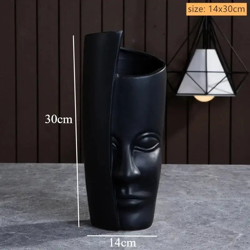 DecorBites™ handmade ceramic face vase in black matte with split design for elegant home decor art vase sculpture