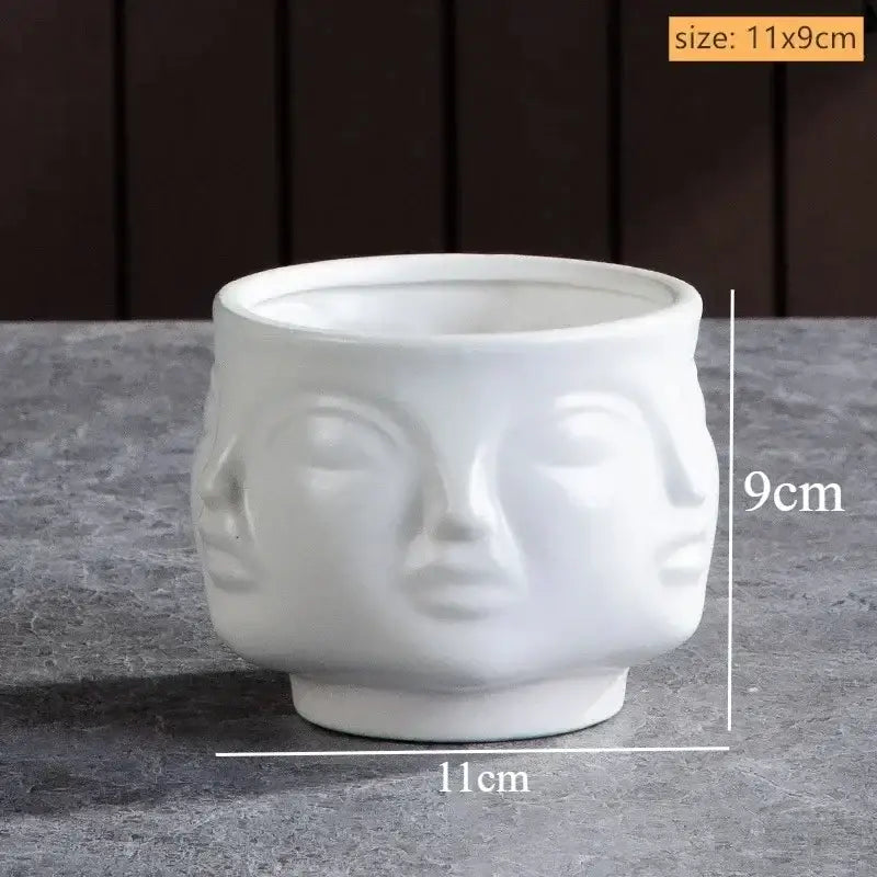 White handmade ceramic face planter with three facial profiles by DecorBites for modern home decor art vase sculpture