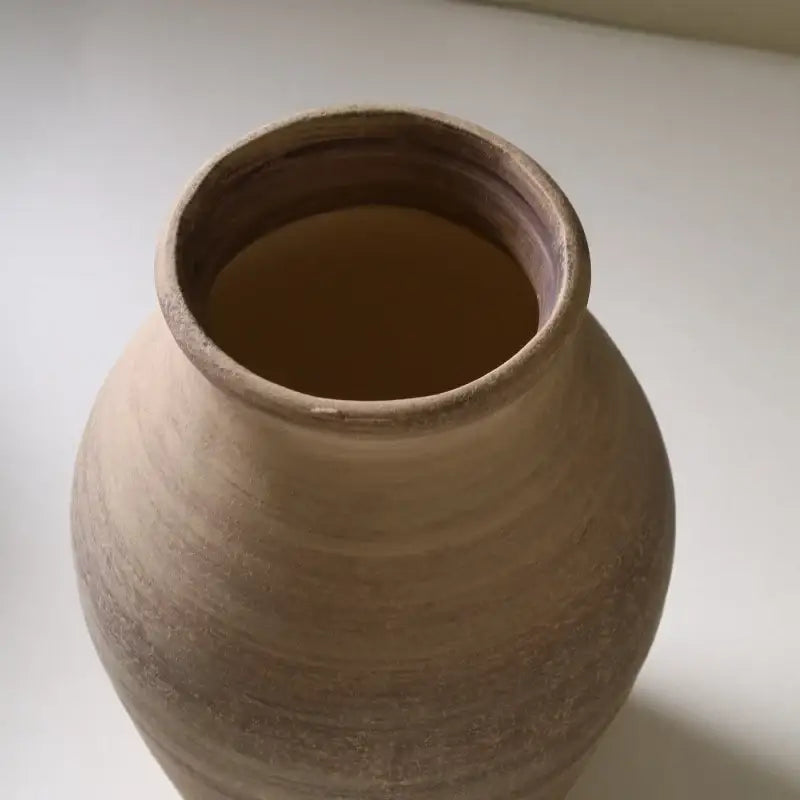 Earthenware ceramic vase with rounded body and wide flared rim handmade ceramic vase for home decoration