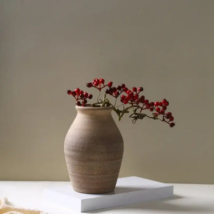 Earthenware handmade ceramic vase by decorbites with subtle ridges and warm beige finish for home decoration