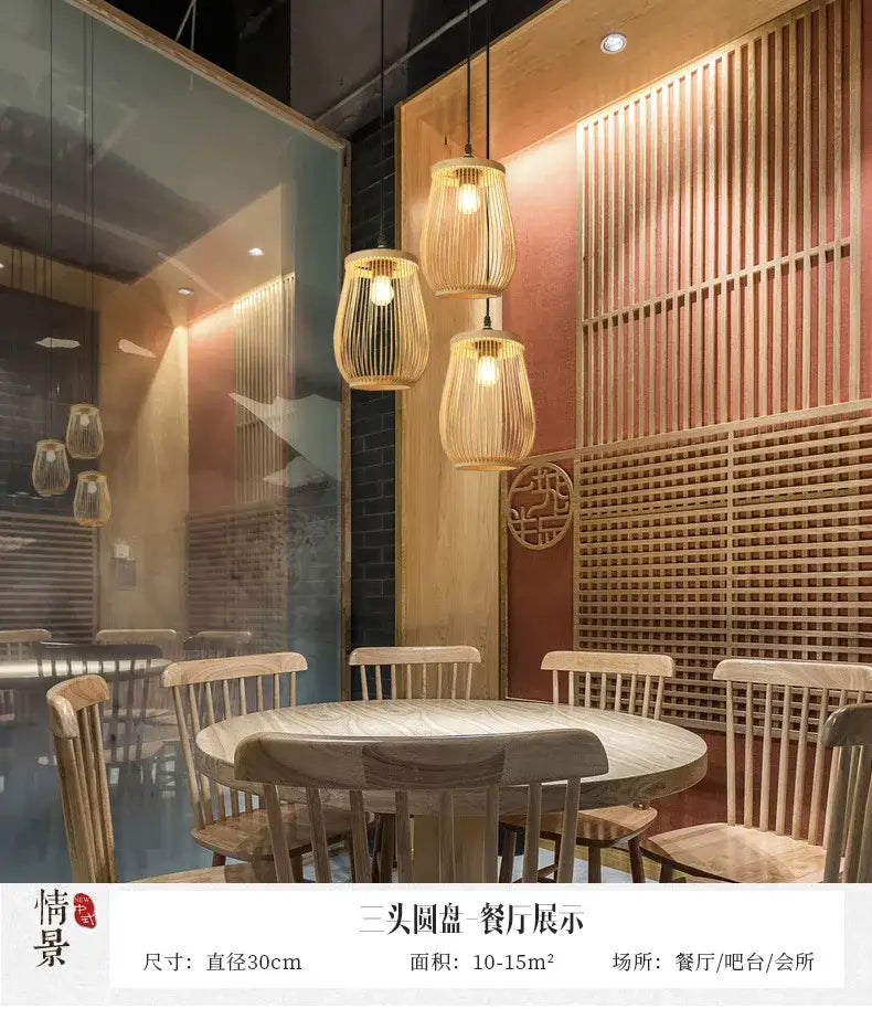 Three hanging bamboo pendant lights with warm glowing bulbs in a decorbites™ handmade chinese rattan wicker pendant ceiling light