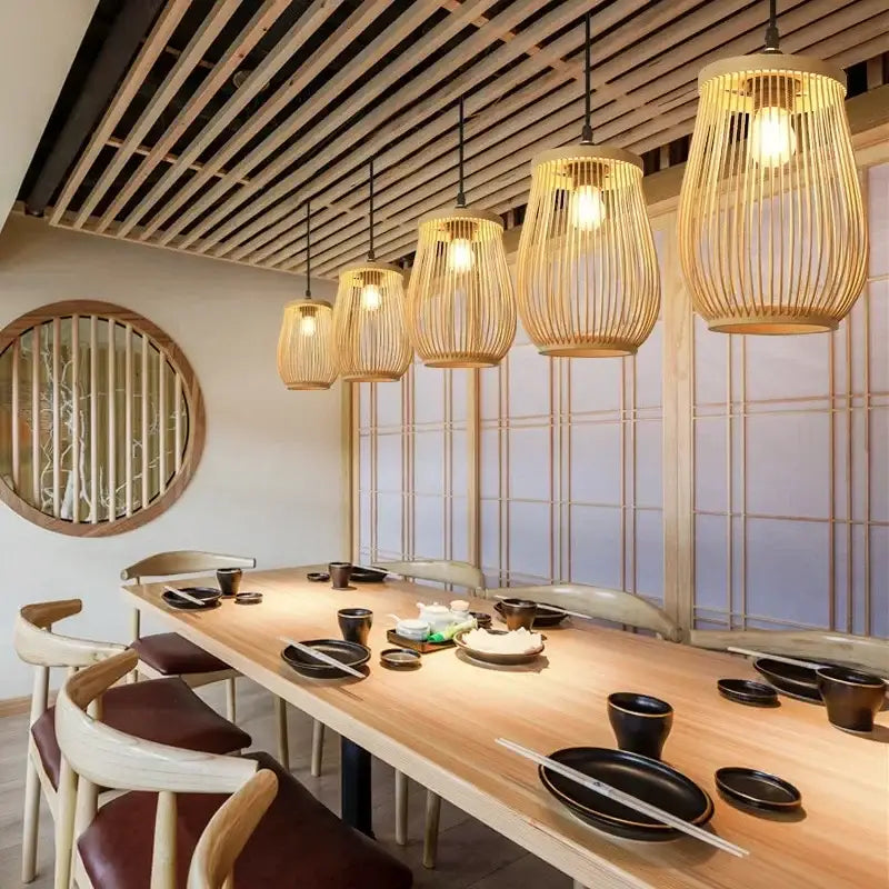 Decorbites™ handmade chinese rattan wicker warm-toned woven bamboo pendant lights above dining table