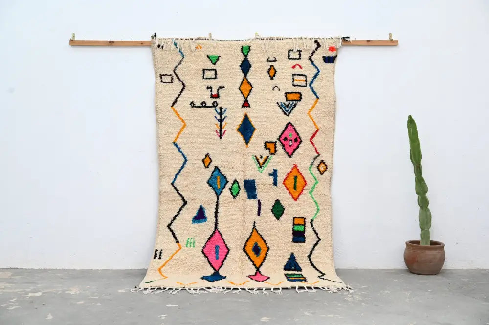 Beige DecorBites handmade moroccan azilal rug with colorful orange pink green and blue geometric patterns 222 x 139 cm