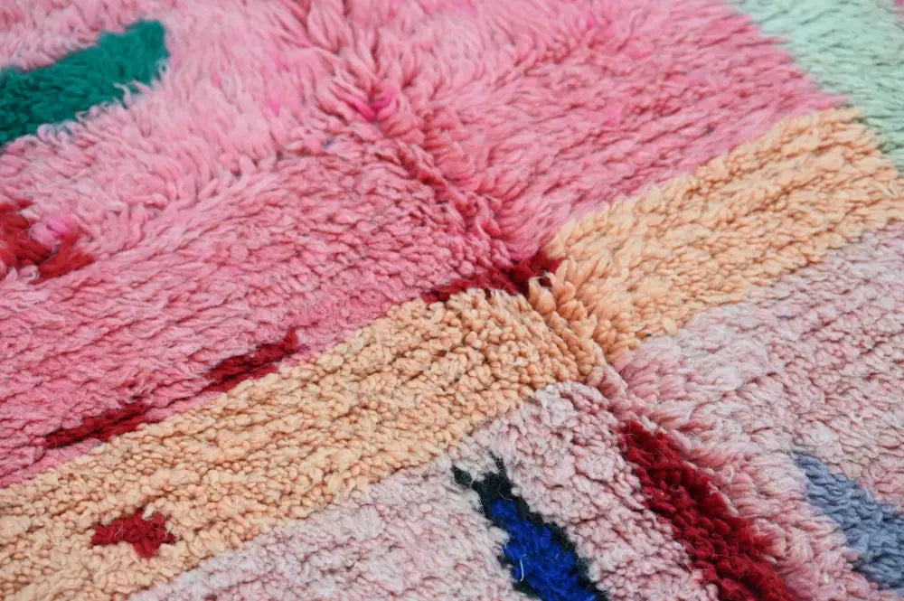 DecorBites™ handmade moroccan azilal rug in soft pink peach teal and blue wool with a textured fluffy pattern, 244x147 cm