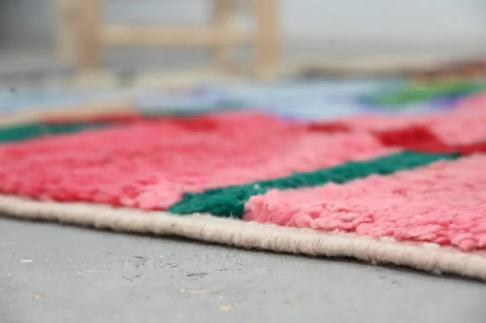 Decorbites™ handmade moroccan azilal rug with vibrant pink and green woven texture and natural beige border 244x147 cm