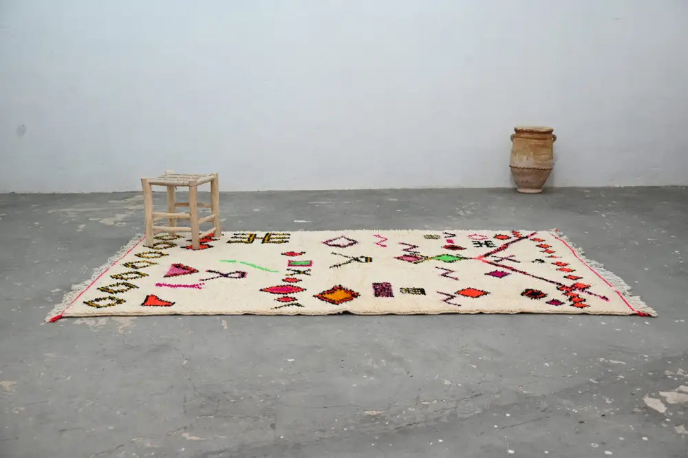 Decorbites handmade moroccan azilal rug cream with vibrant red green and black geometric patterns 247x146 cm